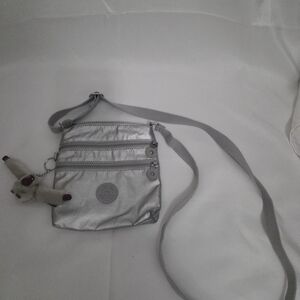 Kipling Silver Crossbody Bag with Charm